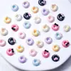 Accesorios de Arte de Uñas de Dibujos Animados de Rosquilla con Lazo de Gatito Color Macarrón Accesorios de Uñas Portátiles Funda para Teléfono Móvil Accesorios de Bricolaje