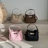 Transfronterizo 2026 Nuevo Estilo Simple y Elegante Ultra-Trendy Bolso de Mano para Oficina Chic Retro Patrón Lichi Moda Bolso Cubo