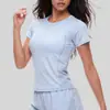 Nueva camiseta de manga corta ligera, transpirable y de secado rápido con malla lateral para deportes, running y fitness para mujer