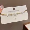 Pulseira Retrátil de Opala Planeta Lua de Alto Senso Fashion Estilo Retro Doce Frio Verão Novo Estilo