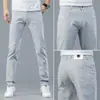 Hong Kong 2026 Otoño Nuevos Jeans Casuales Elásticos Versátiles de Marca de Alta Gama para Hombre, Corte Recto Delgado, para Verano