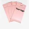 Bolsas de burbujas perladas rosas cuidadosamente seleccionadas con asas, personalizables con logo, bolsas de mensajería para ropa engrosadas a prueba de golpes con asas perforadas