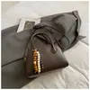 Bolsa Nova de Inverno 2025 Estilo Vintage Almofada para Mulheres, Bolsa Transversal Estilosa, Bolsa de Mão Tendência de Nicho, Bolsa de Boliche para Mulheres