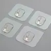 Pegatinas domésticas sin costuras no se oxidan sin perforaciones gancho para pañuelos fuerte para el hogar baño cocina baño impermeable gancho adhesivo