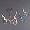 Tijeras pequeñas vintage creativas en forma de cruz de titanio al por mayor para belleza, arte del té, corte de hilo de bordar, tijeras para hojas de grulla para uso doméstico, doradas