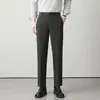 Pantalones casuales ajustados de estilo coreano para hombre de otoño, pantalones cropped de estilo británico, pantalones de traje holgados ajustados de estilo británico para estilista