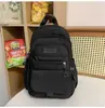 Mochila casual de moda estilo coreano transfronteriza modelo nuevo 2026 bolsa escolar de gran capacidad mochila versátil linda de moda para mujer