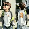 Otoño/Invierno 2026 Nueva Camiseta Térmica de Polar para Niños Cuello Redondo Mangas Raglán Largas Capa Base Elegante Ropa Interior Cálida para Niños Medianos a Grandes
