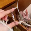 Estilo europeo y americano, sutilmente incrustado con circonita cúbica, pulsera versátil para mujer, lujo ligero, diseño de nicho con un toque de alta gama, ajustable y extensible, al por mayor