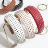 Moda de estilo europeo y americano simple retro de alta gama remache cuero diadema de ala ancha niñas viajeras diadema versátil accesorios para el cabello