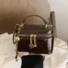 Bolso Pequeño de Lujo Estilo Acolchado de Diamante con Cadena para Mujer 2026 Nuevo Otoño Gama Alta Melamina Bolso de Hombro Cruzado de Mano