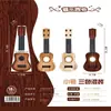 Popular en línea popular Guitarra Ukulele mini simulación instrumento musical de educación temprana juguete para tocar regalo venta al por mayor