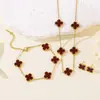 Acero de Titanio No se Desvanece Flor de Cuatro Hojas Doble Cara Set Collar para Mujer, Moderno y Elegante, Cadena Clavicular de Lujo Ligero Celebridad de Internet Pulsera Venta al por Mayor