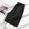 Pantalones cortos transpirables de seda helada para hombre, pantalones casuales versátiles de pierna ancha para mujer, ajustados, sueltos, de longitud hasta la rodilla, para verano.