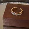 Anillo con letra H Esmalte Lujo Accesible Gama Alta Abierto 2025 Nuevo Estilo Caliente Diseño de Nicho Anillo Pequeño Único para Mujeres