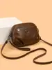 Bolsa de mão de alta qualidade, estilosa e transfronteiriça para mulheres de meia-idade, nova coleção 2026, design retrô e minimalista, bolsa de ombro, bolsa transversal e porta-celular