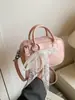 Bolsa de Bowling Feminina 2026 Estilo Novo de Primavera Simples e Fashionável Bolsa de Ombro de Nicho Popular de Alta Qualidade Bolsa Transversal
