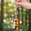 Estilo Mori Borla Natural Cáscara de Fruta Sonajero Colgante DIY Estilo Bohemio Retro Cuerda Colorida Carrillón de Viento Colgante para Bolsa Decoración de Coche