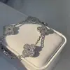 Libro Rojo Mismo Moda Conjunto de Cobre Circonita Flor de Cuatro Hojas Pulsera Exquisita Brillante Pulsera para Mujer Nueva Pulsera de Flor