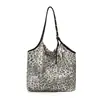 Bolsa de lona a rayas casual estilo coreano para mujer, perfecta para otoño e invierno, con un look relajado y elegante, gran capacidad, versátil y adecuada para el trabajo o los desplazamientos.