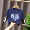Camiseta de manga larga suelta de algodón puro para niño, camiseta interior de otoño para niño, estampado de dibujos animados de moda, top para niño estilo americano