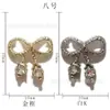 Celebridade da Internet Borboleta Oca Liga Joias para Nail Art Urso Diamante Luxo Leve Laço Cruz Coroa Acessórios Atacado