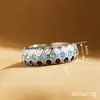 Anillo Exquisito Creativo Más Vendido de Cao Shi Temu, Joyería de Circonita Azul de Arco Circular, Lujo Accesible y Anillo Individual Llamativo