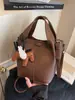 Bolso de Mano de Gran Capacidad de Moda y Sencillo, Bolso Cubo con Textura Elegante, Bolso Pequeño para Mujer, Bolso de Hombro y Cruzado de Moda Nuevo 2025