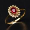 Nuevo y exquisito anillo de apertura con gema de turmalina roja simulada en forma de flor, pendientes de temperamento para mujer, joyería para las orejas al por mayor