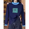 Camiseta Versátil Feminina 2026 Nova Moda com Manga Longa, Gola e Punhos em Algodão Puro em Cores Contrastantes, Adequada para Primavera e Outono