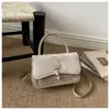 Bolso de mujer moderno y sencillo, nuevo modelo 2026, bolso con patrón de ondas, bolso cuadrado pequeño de moda de alta gama para bandolera y hombro