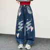 Jeans de Primavera y Otoño para Niñas 2026 Nuevos Casuales Estilo Coreano Niña Niños Medianos y Grandes Comercio Exterior Graffiti Vaqueros Jeans de Pierna Torcida