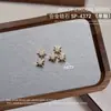 Joyería para Uñas Starburst Aleación Circonita Montón Diamante Alas Colgante Estrella Cuatro Picos Diamante Accesorios Decoraciones para Uñas