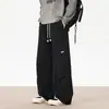 Pantalones rectos con corte curvo para hombre, nuevo estilo otoño 2026, corte holgado, pantalones largos fluidos, pantalones casuales versátiles de pierna ancha para adolescentes