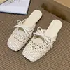 Zapatillas de Verano Francesas de Punta Plana para Mujer Ropa de Exterior Verano 2026 Nuevas Sandalias Romanas Caladas Sandalias Tejidas Exquisitas