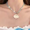 Colar Estrela-do-Mar e Concha de Metal Estilo Oceano Europeu e Americano para Mulheres Bohemian Ins Colar Clavícula de Pérola Falsa