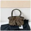 Bolsa de ombro retrô elegante e de alta qualidade, nova para 2026, de grande capacidade para o dia a dia, com um design de bolsa tote descontraído, plissado e de cor sólida