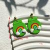 Calle popular transfronteriza. Pendientes verdes del Día de San Patricio, diseño de nicho, pendientes de temperamento de mujer de alta calidad, venta al por mayor