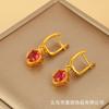 Aretes Clásicos de Moda de Rubí y Zirconia Trébol de Cuatro Hojas de la Suerte Aretes de Flor Eterna Hebilla para la Oreja Temperamento Joyería para la Oreja al Mayoreo