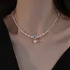 Collar de perlas degradadas grande y pequeño, cadena para la clavícula de lujo ligero de nicho para mujer 2026, accesorio de cadena para suéter, cadena de sonrisa