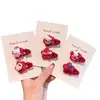 Clip para el pelo rojo de Año Nuevo para niños, clip lateral de tela con gato de dibujos animados para niñas, clip lindo que no daña el flequillo, clip para el pelo de bebé