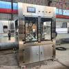 Máquina de Enchimento de Líquidos Óleo Comestível Óleo de Gergelim Enchimento de Líquidos Máquina de Tampagem Automática de Dupla Cabeça para Enchimento de Óleo