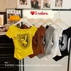 Camiseta versátil de manga corta con estampado, estilo chica hot americana de un solo hombro, dulce y fresca, para mujer, nuevo top irregular ajustado, moderno