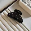 Accesorios para el cabello elegantes y versátiles de lujo ligero, pinza para el cabello negra de temperamento francés retro, pinza de tiburón negra de moda, para recogido medio del cabello, moda.