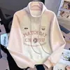 Sudadera de manga larga estilo universitario para mujer, nueva colección primavera/otoño 2026, corte holgado, cuello alto, media cremallera, top estampado, chaqueta corta casual