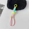 Adequado para todos os tipos de acessórios de capa de celular pingente de mochila decorações rosto sorridente cor sólida corda curta com pingente de cartão para pendurar