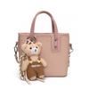 Bolsa de Mão para Mulheres 2025 Novo Estilo Bolsa de Ombro Texturizada Simples e Doce Bolsa Transversal Feminina Bolsa Balde Cesta de Vegetais da Moda
