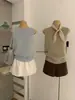 Wgwe9417 Ropa de Mujer Shisanxing de Guangzhou 2026 Verano Nuevo Chaleco de Punto sin Mangas de Cuello Redondo de Gama Alta
