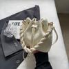 Bolsa Plissada Versátil da Moda Feminina Verão 2024 Nova de Nicho Simples Bolsa Saco de Tecido para Comutador Transversal