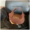 Bolsas de Nicho de Alto Padrão Transfronteiriças para Mulheres Outono e Inverno 2025 Nova Bolsa Tiracolo de Ombro Único Fosca Retrô Popular Bolsa Dumpling